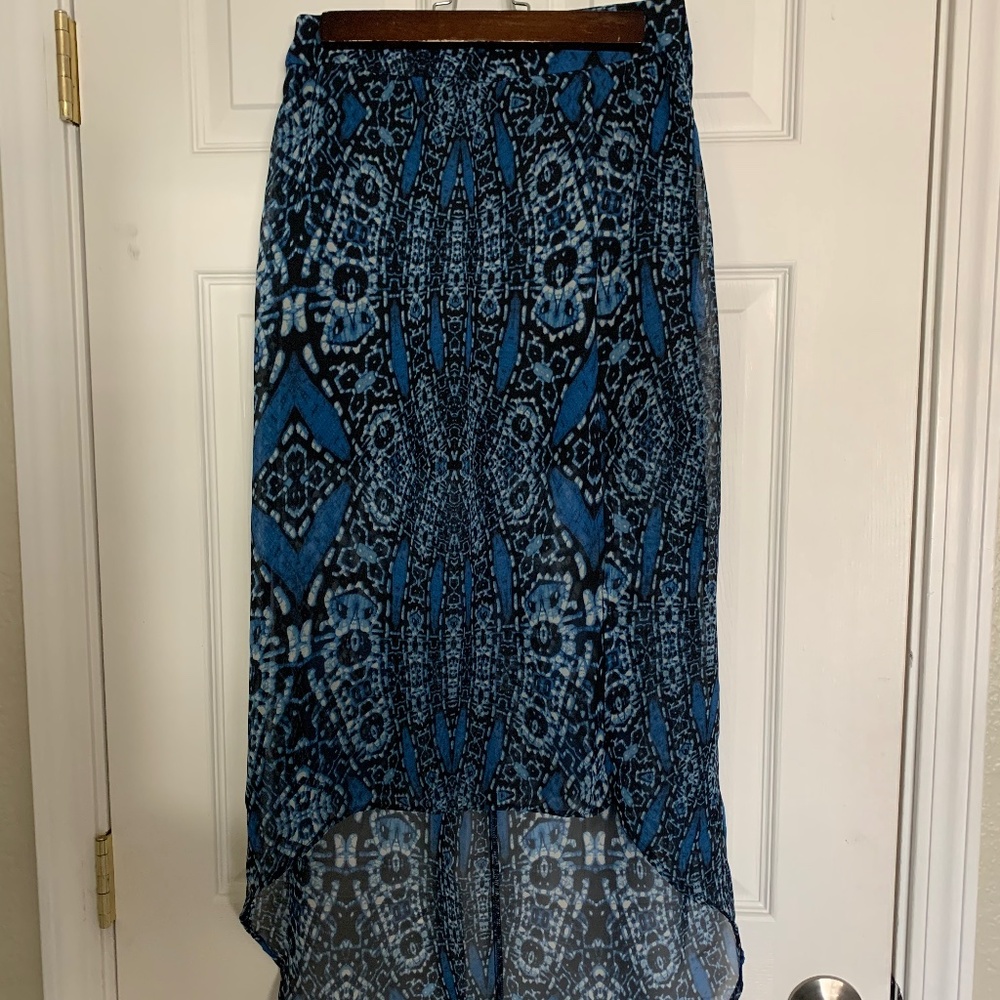 Sheer blue skirt with black mini skirt underneath